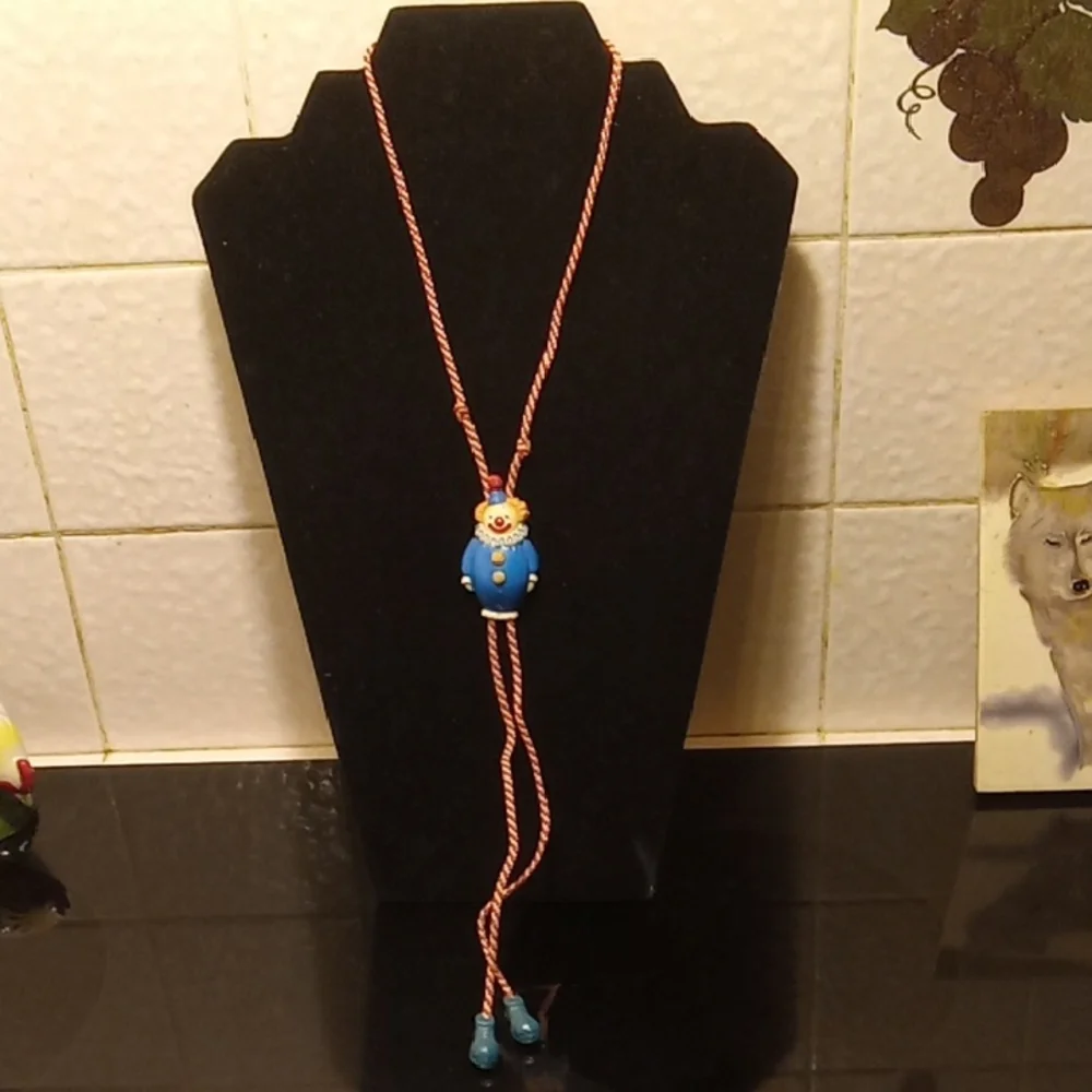 Brand our Junk vintage Avon Bolo Tie 1983 Clow